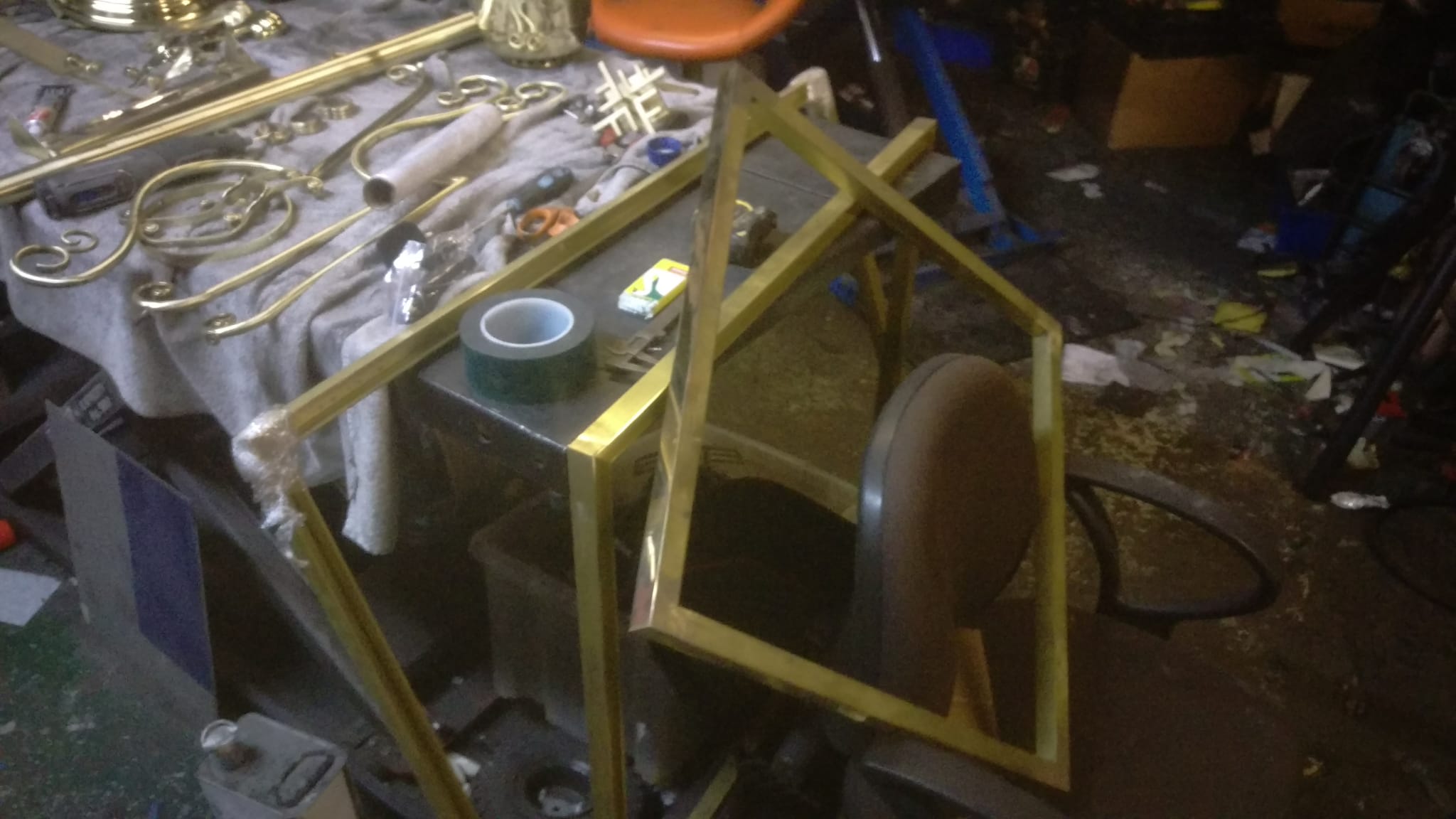 door handles and chandelier frames and other chandelier parts being prepared for polishing